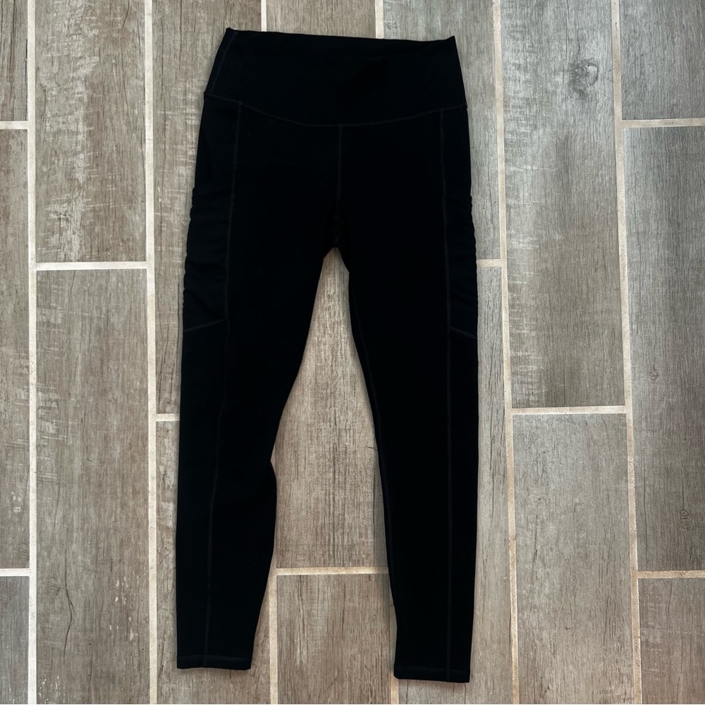 Fabletics M Black Powerhold Leggings with Mesh Pockets